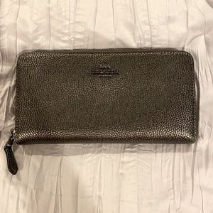 Coach leather accordion zipper wallet.